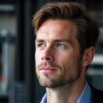 Professional headshot of Mark Jensen